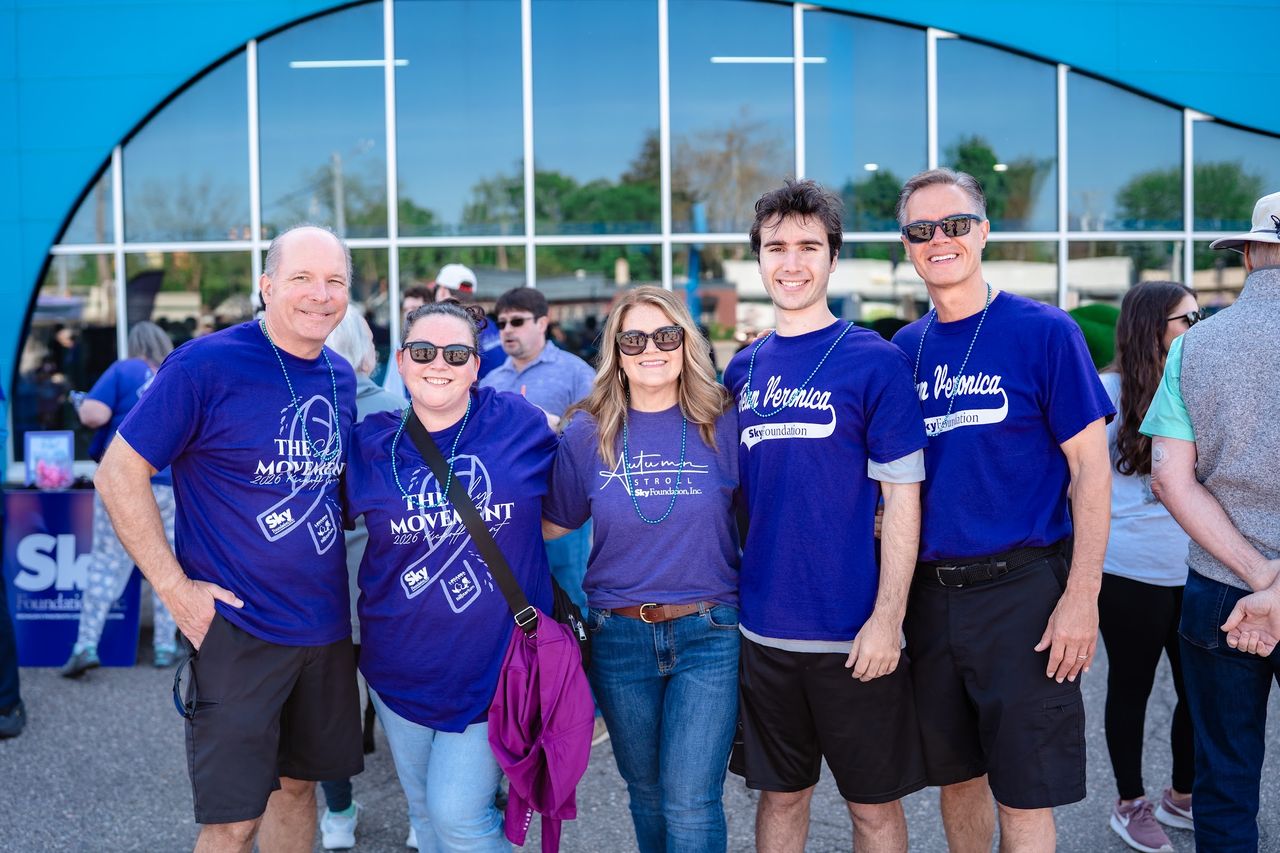 A team in matching Movement shirts